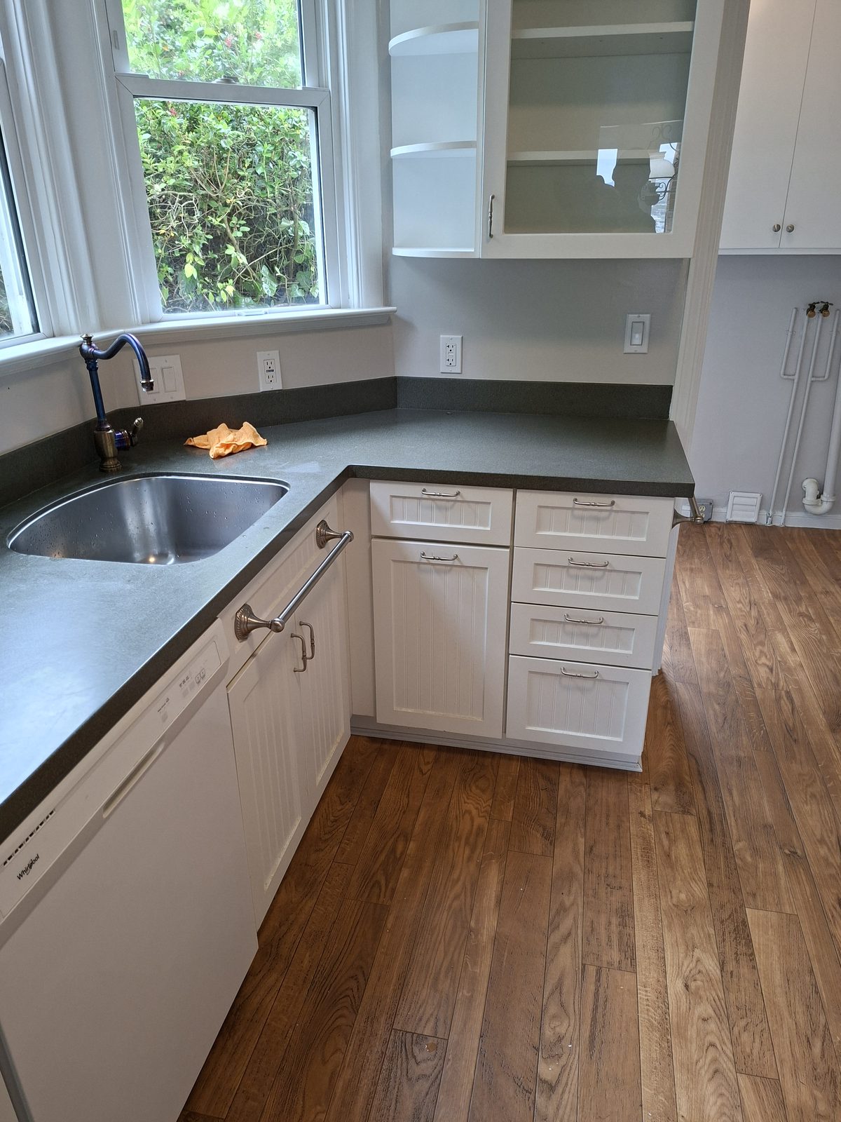 Remodeled kitchen in a Mission District flat with hardwood floors and updated cabinetry