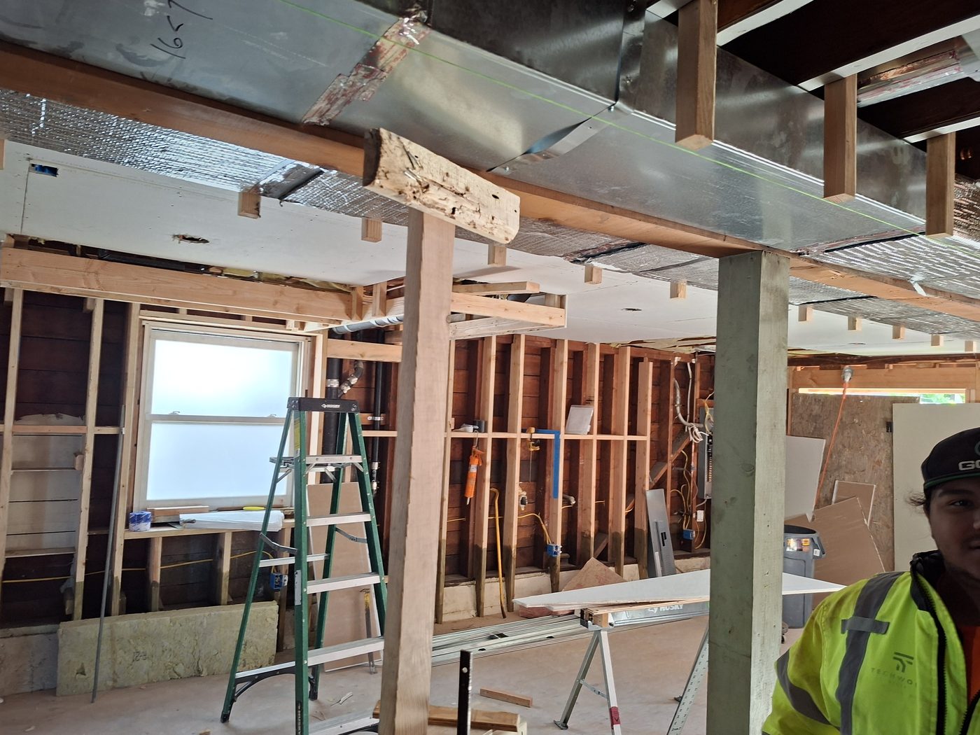 Behan Builders crew member during structural work on new foundation installation in San Francisco